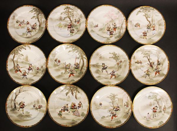 Antichi piattini da dolce, Giappone, sec, XX, in porcellana bianca decorata a figure e paesaggi, diam. cm 18,3