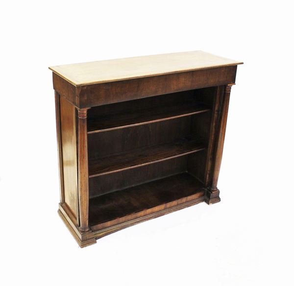 Libreria a giorno, sec. XIX, in noce, due mensole tra colonne tornite desinenti in capitello a motivi anulari, piede a fascia continua, cm 107x39,5x99
