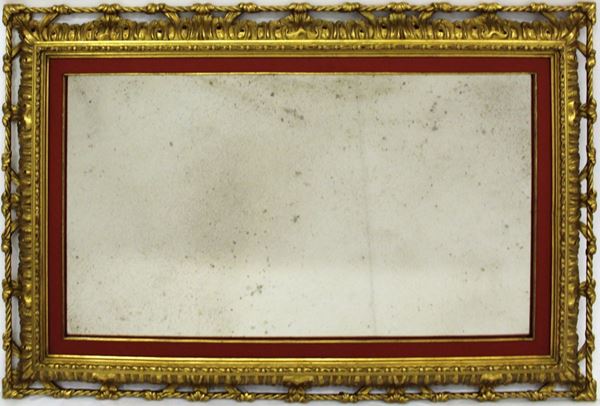 Specchiera, sec. XX, in legno intagliato e dorato, luce rettangolare, cm 91,5x60,5