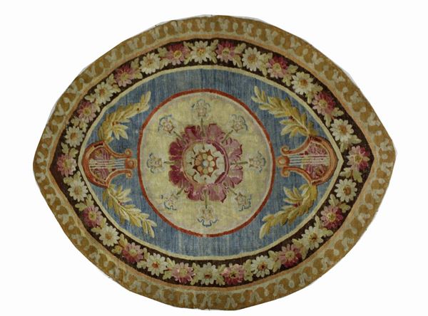 Tappeto abbuson, Francia, sec. XIX/XX, perimetro ogivale, impianto a decoro floreale a medaglione centrale, cm 190x154