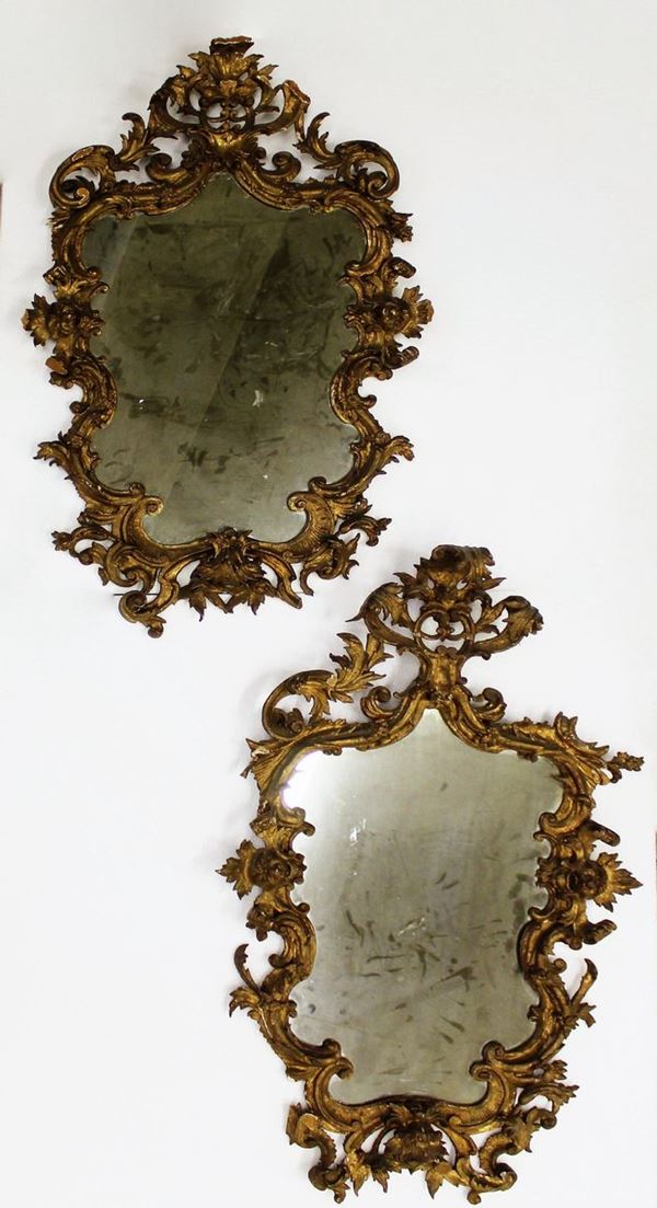 Coppia di specchiere, sec. XIX, in legno intagliato e dorato, luce        