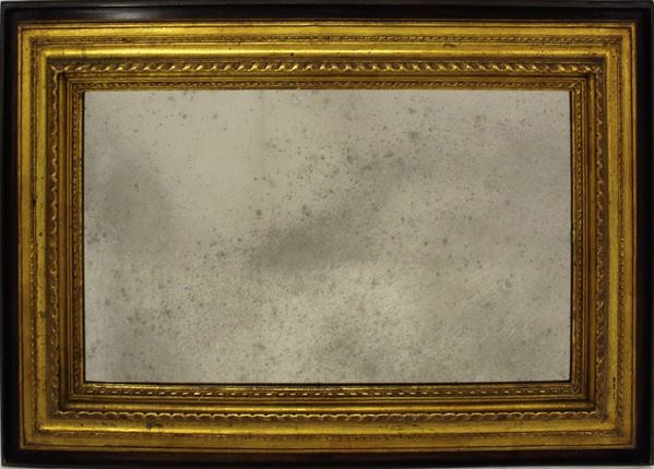 Specchiera, sec. XX, in legno tinto e dorato, luce rettangolare, cm&nbsp;&nbsp;&nbsp;&nbsp;&nbsp;&nbsp;&nbsp;
