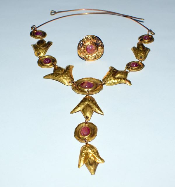 DEMI - PARURE IN LAMINA ORO E RUBINI