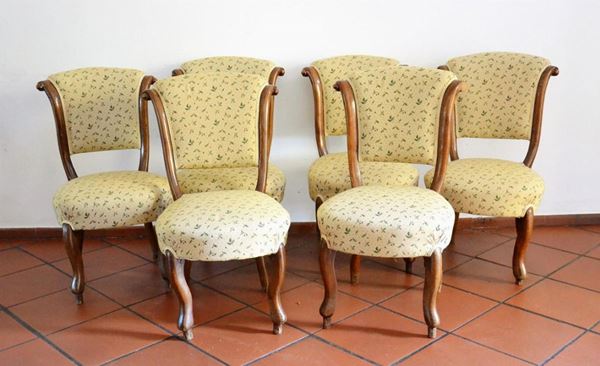 Sei sedie, sec. XIX, in noce, gambe mosse, sedute e schienali in stoffa a fiori, alt. cm 77
