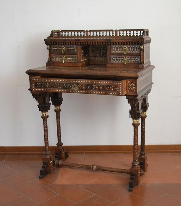 Scrittoio, sec. XIX, in vari legni riccamente intarsiati, scarabattolo con quattro cassetti, base con cassetto, cm 74x46x100