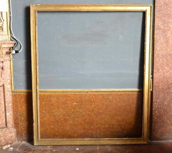 Cornice, sec. XIX, in legno dorato, cm 136x163, luce cm 123x149, difetti