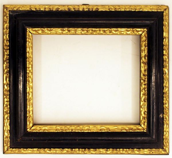 Cornice rettangolare, sec. XIX, in legno ebanizzato, luce rettangolare&nbsp;&nbsp;&nbsp;&nbsp;