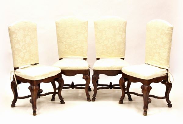 Quattro sedie, sec. XIX, in castagno, rivestite in stoffa nei toni del&nbsp;&nbsp;&nbsp;&nbsp;