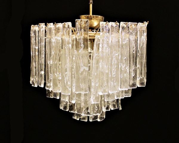Lampadario, anni 70, in metallo dorato e vetro incolore, struttura quadrata