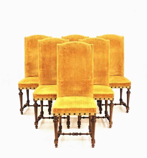 Sei sedie, in stile 600, in noce, rivestite in velluto nei toni del giallo,