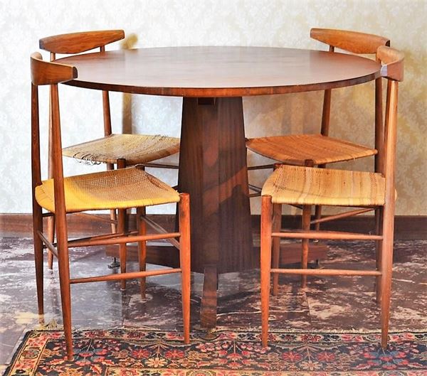 Tavolo e quattro sedie, anni 50, in palissandro,                          