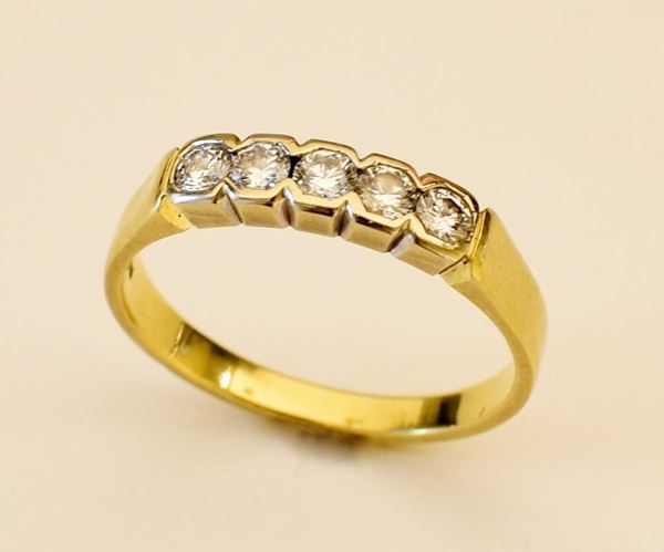 ANELLO RIVIERA , IN ORO GIALLO E DIAMANTI