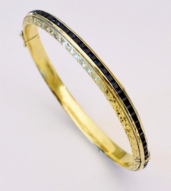 BRACCIALE RIGIDO IN ORO GIALLO E ZAFFIRI&nbsp;&nbsp;&nbsp;&nbsp;&nbsp;&nbsp;&nbsp;&nbsp;&nbsp;&nbsp;&nbsp;&nbsp;&nbsp;&nbsp;&nbsp;&nbsp;&nbsp;&nbsp;&nbsp;&nbsp;&nbsp;&nbsp;&nbsp;&nbsp;&nbsp;&nbsp;&nbsp;&nbsp;&nbsp;&nbsp;&nbsp;&nbsp;&nbsp;&nbsp;