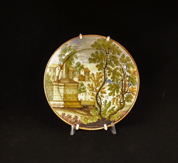 Piatto, sec, XX, manifattura Castelli, in maiolica