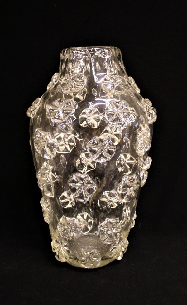 Vaso, Murano, sec. XX, in vetro incolore con applicazioni borchiate, alt. cm 46,5