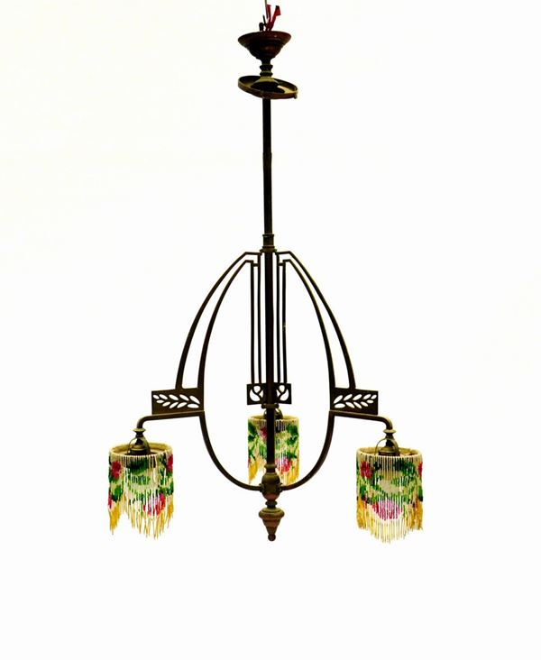 Lumiera, Liberty, in metallo, con fusto sagomatoa forma di uovo, tre luci;  - Asta GIOIELLI, ARGENTI, E OPERE DI ARTE ANTICA E CONTEMPORANEA - Poggio Bracciolini Casa d'Aste