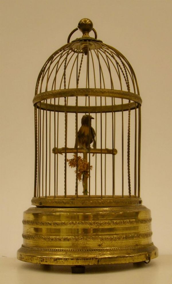 Carillon, sec. XIX, in metallo dorato e forgiato a forma di gabbia con&nbsp;&nbsp;&nbsp;&nbsp;