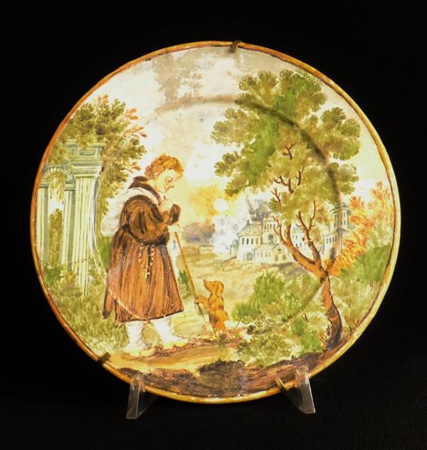Piatto, Castelli, sec. XVII, in maiolica dipinta a&nbsp;&nbsp;&nbsp;&nbsp;&nbsp;&nbsp;&nbsp;&nbsp;&nbsp;&nbsp;&nbsp;&nbsp;&nbsp;&nbsp;&nbsp;&nbsp;&nbsp;&nbsp;&nbsp;&nbsp;&nbsp;&nbsp;&nbsp;&nbsp;