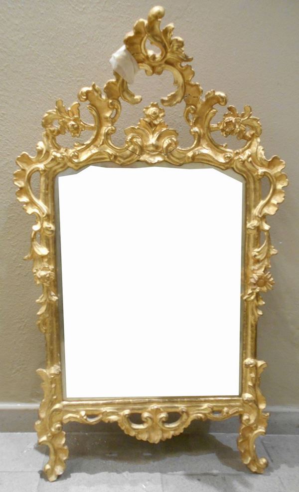 Specchiera, inizi sec. XVI, con cornice dorata e intagliata, cm 104x62,&nbsp;&nbsp;&nbsp;