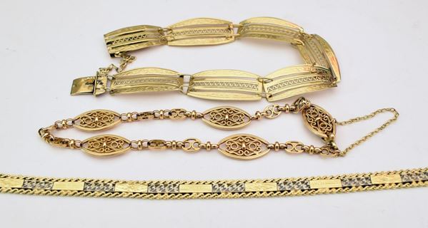 TRE BRACCIALI IN ORO GIALLO                                               