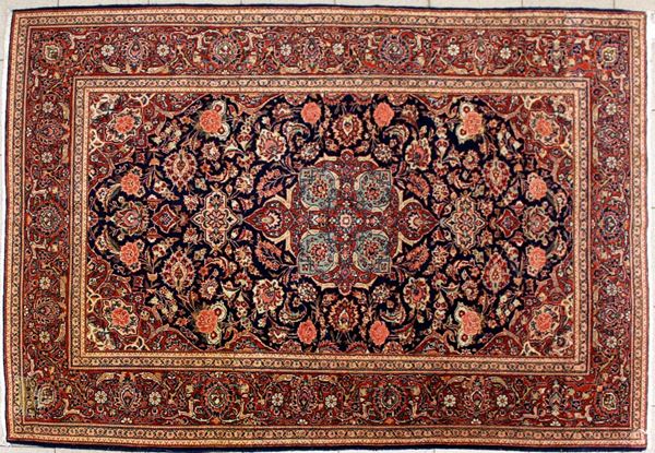 Tappeto Kashan, sec. XX, impianto a motivi floreali multicolori su campo&nbsp;&nbsp;