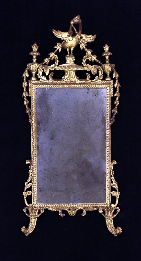 Specchiera, Toscana, sec. XVIII, in legno intaglaito e dorato, luce&nbsp;&nbsp;&nbsp;&nbsp;&nbsp;&nbsp;&nbsp;