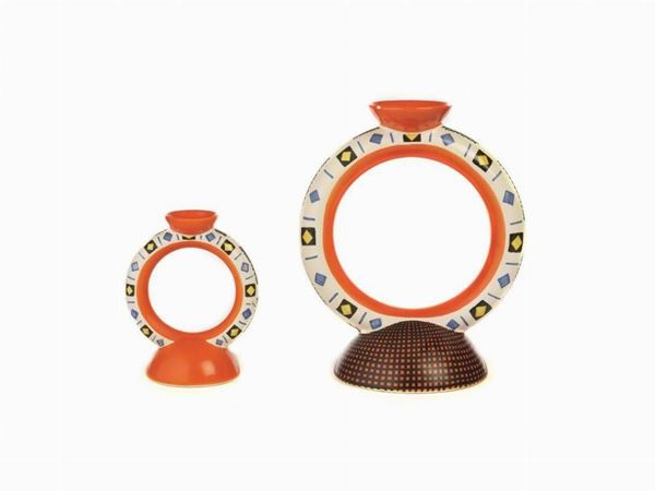 Due portacandele, sec. XX, manifattura Lenci, in ceramica decorata e sagomata, alt. cm 28 e 16 (2)