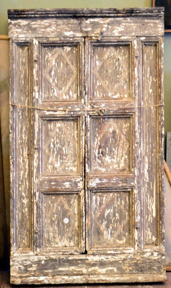 Poltrone, sec. XVIII, a due ante in legno, sagomat                        