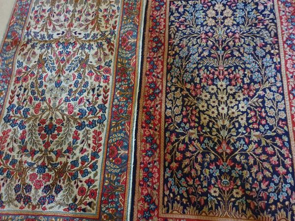 Due tappeti persiani sec. XX, a motivi floreali, cm 165x90 e cm 165x92,&nbsp;&nbsp;&nbsp;