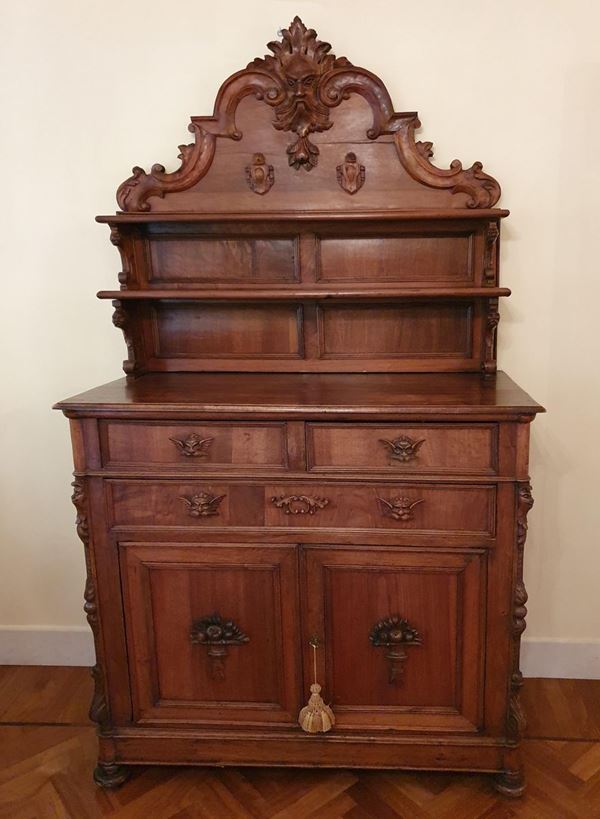 Credenza, sec. XIX, in noce, due sportelli, due cassetti, alzata con vani a