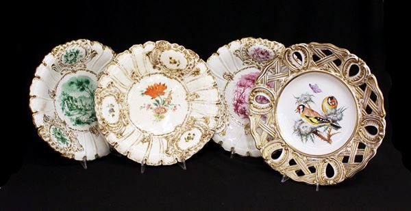 Serie di quattro piatti, sec. XX, manifattura Zaccagnini, in ceramica&nbsp;&nbsp;&nbsp;&nbsp;&nbsp;
