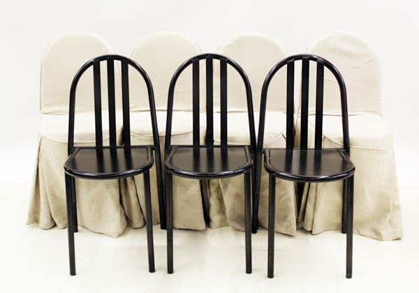 Serie di sette sedie, sec. XX, in ferro, struttura tubolare laccate nei&nbsp;&nbsp;&nbsp;