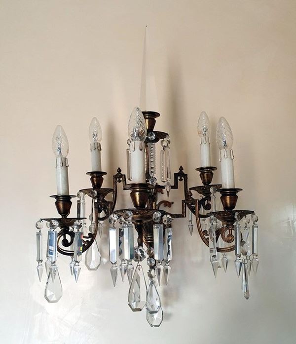 Coppia di applique, inizi sec. XX, in metallo dorato,