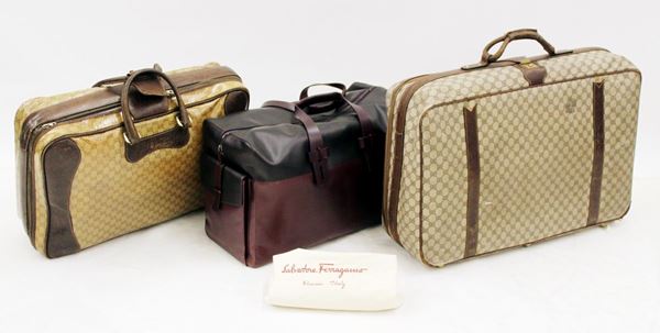 Valigia, sec. XX, produzione Gucci, in tela logata,&nbsp;&nbsp;&nbsp;&nbsp;&nbsp;&nbsp;&nbsp;&nbsp;&nbsp;&nbsp;&nbsp;&nbsp;&nbsp;&nbsp;&nbsp;&nbsp;&nbsp;&nbsp;&nbsp;&nbsp;&nbsp;&nbsp;&nbsp;  - Asta OPERE E OGGETTI D'ARTE ANTICA E CONTEMPORANEA, GIOIELLI - Poggio Bracciolini Casa d'Aste