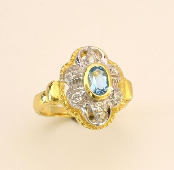 ANELLO IN ORO GIALLO,ORO BIANCO DIAMANTI E                                