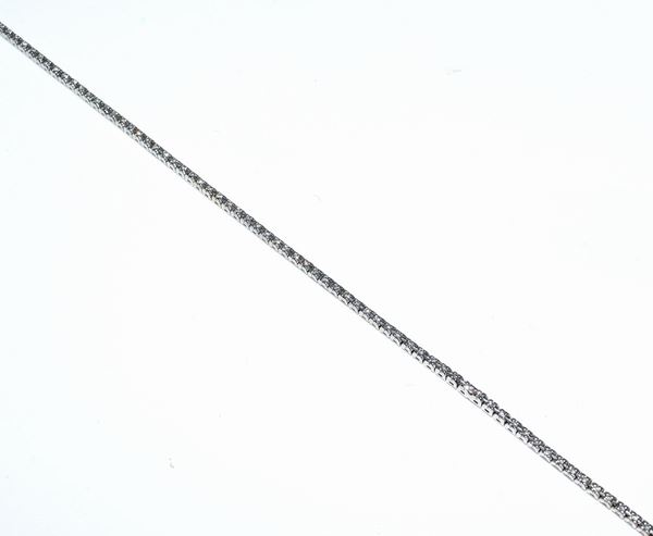 BRACCIALE TENNIS IN ORO BIANCO KT 18 E DIAMANTI                           