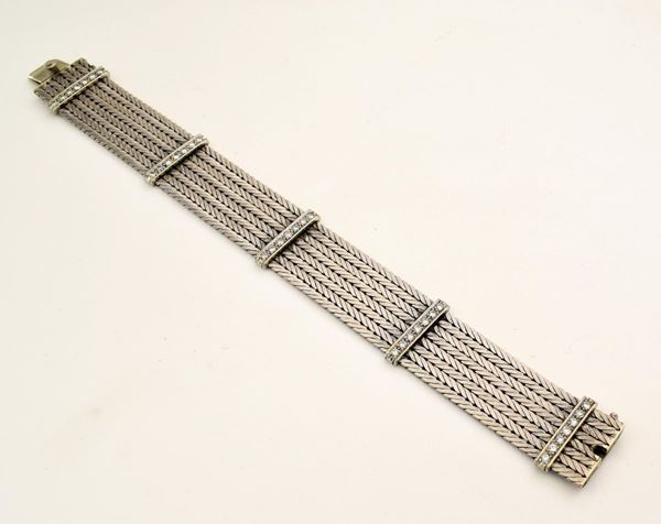BRACCIALE IN  ORO BIANCO KT 18  E DIAMANTI                                