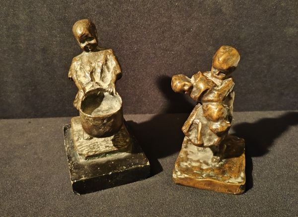



Due sculture, inizio sec XX,