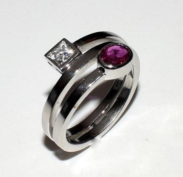 



ANELLO IN ORO BIANCO, DIAMANTE E RUBINO  - Asta ARREDI, OGGETTI D'ARTE, GIOIELLI E ARGENTI - Poggio Bracciolini Casa d'Aste