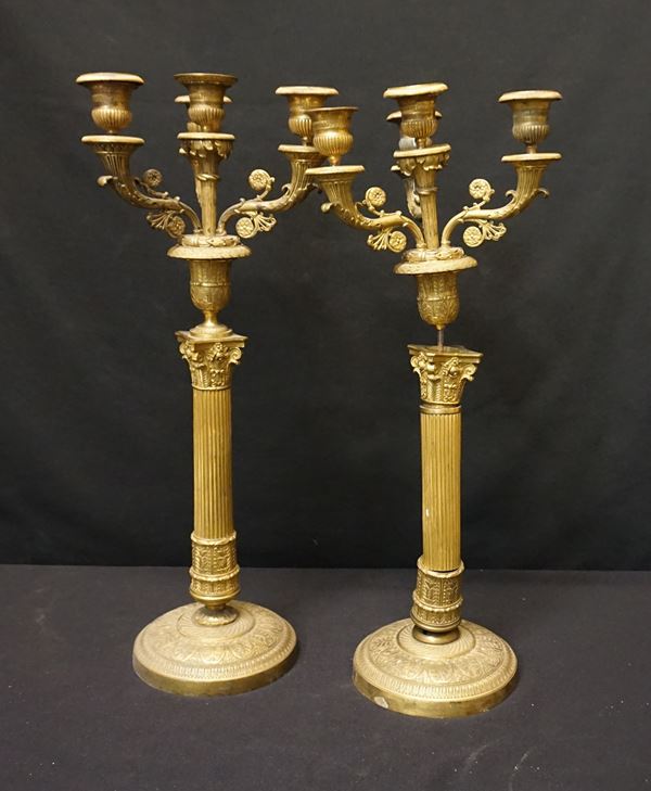 



Coppia di candelabri, in stile Impero.