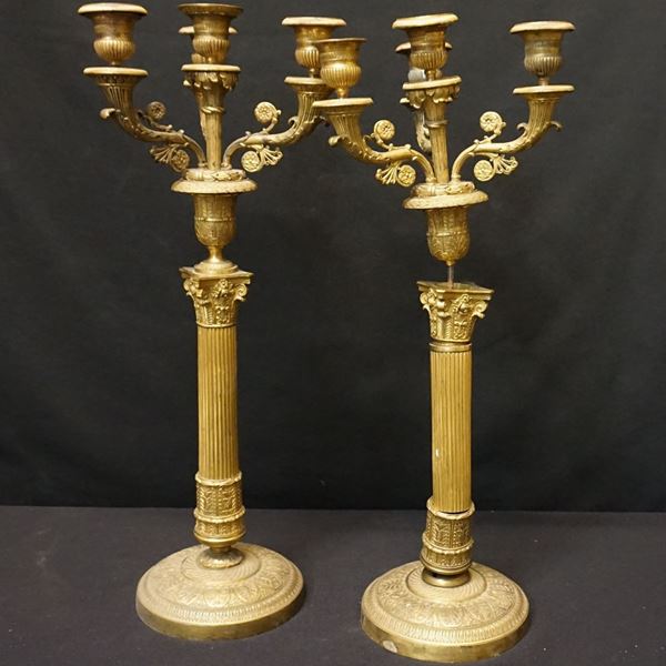 



Coppia di candelabri, in stile Impero.