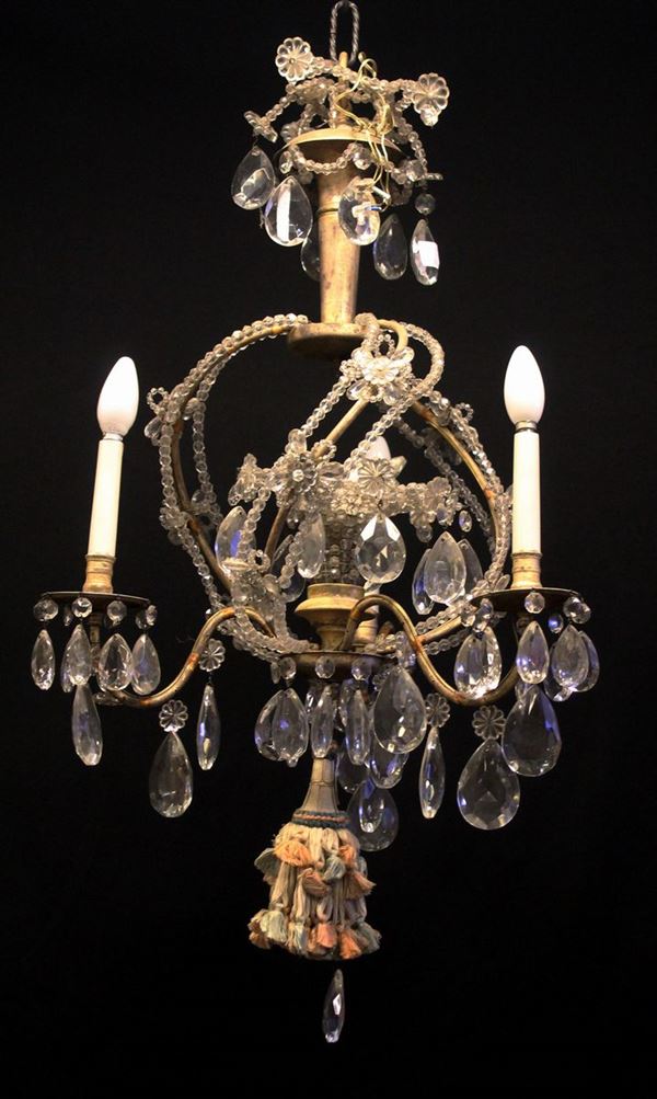 



Lampadario a quattro luci e lampadario a sette luci, sec. XX