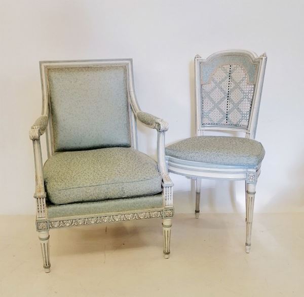 



Poltrona e sedia, in stile 700, in legno laccato bianco,