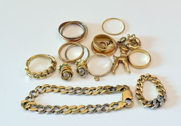 



BRACCIALE E ANELLO IN ORO GIALLO , ORO&nbsp; BIANCO&nbsp; KT18 E DIAMANTI