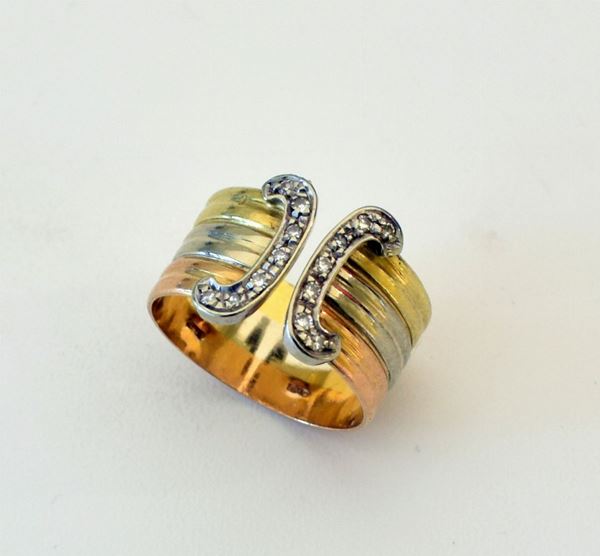 



ANELLO IN ORO GIALLO , ORO BIANCO E DIAMANTI