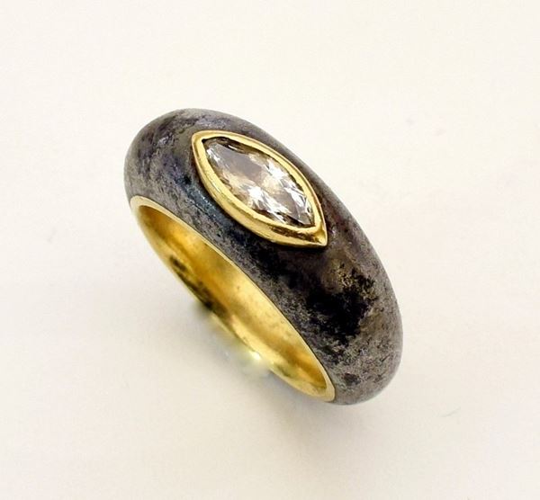 



ANELLO IN ORO 18KT , ACCIAIO E DIAMANTI
