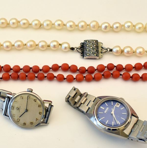 



COLLANA GIROCOLLO DI PERLE