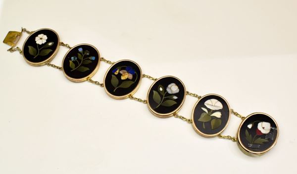 



BRACCIALE IN ORO 9KT E MOSAICI