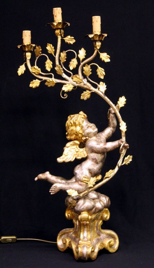



Putto reggicero, sec. XX