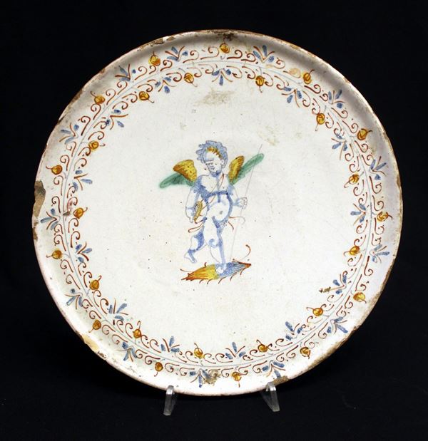 



Parte di alzata, Faenza, sec. XVII
